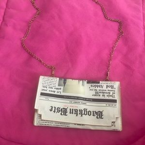 newspaper crossbody bag